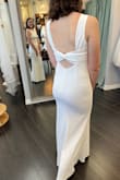 I ADORE this dress! It was the first dress I bought to see if I'd like it for my wedding reception and I was blown away. Doesn't need altering. Stretchy enough to move around and not feel sucked in. It's a snug fit but very comfortable. Amazing material feels very formal and high quality. Obsessed! - Kayla-Ann K.
