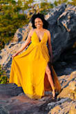 So I was between this dress and another (Lulus) one for a photoshoot and this one was PERFECT! I have small boobs and this one accentuated them perfectly ! I wished the slit was a little higher but still worked out. A fitted dress, so if you're looking for something stretchy with a little "give", this isn't her, but still true to size. - Arlette H.