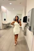 The dress was so comfortable, wore it all day for my graduation in Spring 2023. It's the right mix of sexy and formal for graduation ceremony. It wasn't see through at all which made me love the dress a lot.  The dress is a nice ivory color and went well with my beige heels. I wore it with a shape wear in the mirror selfie, and the shape wear lines kinda showed around the butt so I ditched it for my D-day and I felt much better with how well it hugged my curves. The dress could be short while sitting, I'm short so it worked out and was the right length for me. It doesn't ride up a lot, sometimes did while climbing steps. The sleeves felt flimsy to me, but they never were a problem and held on very well. Overall the dress quality is wonderful which is a Lulus guarantee which I love it for :) - Urvashi K.