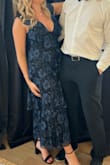 I am usually a medium across the board. However, when the medium came in, it was a little loose in the top area, which is a rare thing for me. I ended up sizing down to a small and that size fit a lot better. I used tape to keep the girls up and back and it ended up being a very flattering dress! - Megan J.