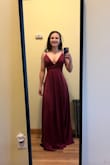 This dress was gorgeous! However, I couldn't wear it for the wedding I ordered it for because the rib cage area had absolutely no give at all. The dress looked amazing on me but without any elasticity in the ribs I legitimately could not breathe. Will be returning. - Gretchen F.
