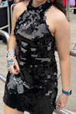 I wore this dress to TS Era's Tour N13 and got lots of compliments on it. However it was really uncomfortable to sit, the sequins do fall off easily like some of the reviews have stated, and some of the sequins received to lay flat against my body which was annoying. It also awkwardly sat loose around the upper chest and mock neck where I definitely regretted not pinning it before the concert. I also have yet to wash it as I am scared more sequins will come off afterward. - Raegan C.