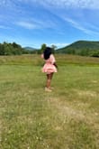 This romper was super flattering and comfortable. I wear a US 4-6 so I ordered the medium but the sleeves are not as fitting as I would have liked. The only downside is that the zipper is on the back so you will need some assistance putting it on and taking it off. Otherwise, buy it! - Tamera M.