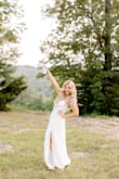 I bought this dress for our engagement pictures. It was big around the top area but I made it work. It was perfect for our pictures and very comfortable.
If you're looking for a white dress this is the one! - Rony B.