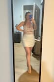 This skirt is super flattering and the bodycon style isn't overdone. I bought it to wear with the "After Your Heart Ivory Long Sleeved Bodysuit" and they match seamlessly so if you buy this you should look into buying the bodysuit too. The skirt isn't see through, hits at a reasonable length for a short skirt, and doesn't ride up. I love it! - Alison H.