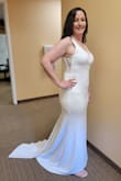 I ALMOST kept this is as my wedding dress, however, I'm self-conscious of my arms and decided to go with a long sleeved one. This dress is so pretty, it fit me very well and I love the train, but that was the other problem - our wedding will be outdoors with a tent, and the material for the dress is very heavy, so I didn't know exactly how I would handle the train. It's a beautiful dress but I ended up returning it when I found the one. - Rachael M.