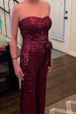 This was initially purchased to wear to a black tie event, the Red Ribbon Gala, w attire theme "Red Carpet Disco chic."

I loved this on the site and tried to make it work in sm and med. The sm fit a bit too tight in the bust and a tiny bit in the torso (have a straight figure from my rib cage down. No vivacious curves of any kind. Even w squats & lunges, I have a sad flat rump.) The med was slightly too lg in the bust and I was afraid of slippage. That may be because I don't wear strapless rompers/dresses as low down on my chest as the models do. The sequin sewing on the bodice was also askew.
I even purchased 2 meds hoping one was initially just cut a bit "off" since it wasn't even symmetrical when on a hanger. The 2nd was symmetrical but still not my fav.

I wished one of these would have been perfect for the occasion, The cut/fit was less flattering then I had hoped; coupled with the fact that in person, it didn't present as fancy as the online images portrayed the jumpsuit, made this it a no for me. - Molly M.