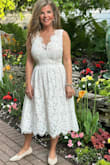 The dress was really pretty but I'm short waisted and I felt like it sat on my momma belly at the wrong place. It was heavy fabric and lined very well. A small would have been too big. The xs would have been great in my younger days. - Amie S.