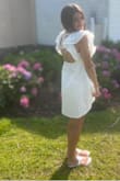 This dress fit my daughter perfectly! It was so dainty yet fun with the beautiful ruffle sleeves! She looked just perfect for her big graduation day! Will definitely buy from Lulus again! - Kristin H.