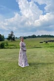 I wanted a long dress for a semi formal outdoor June wedding in the mountains of Virginia. I knew it could get a little chilly and I was happy to have the long sleeve vs carrying something extra. I was comfortable from day to evening. The material is light weight but the dress is very long and I had to pick it up to walk comfortably (wore flats).
I'm a little busty so I opted to wear a lace cami for extra coverage but if I had tape it would have worked as well.
I received many compliments. If you are tall, this dress is perfect!! - Lindsay C.
