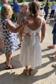 Perfect dress for my open house. I usually wear a small- medium, but with the tie back I ordered the small. So comfortable. - Jill H.