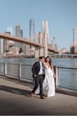 I loved the dress the moment I saw it here. It was a bit large for my upper body, so I altered it at a local dressmaker place. With 3.5 in heels, the dress has the perfect length for me. I wore this dress for our wedding photoshoot in NYC. Highly recommend. - Iuliia M.