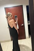 This dress fits like a glove! I actually purchased it a couple of years ago and forgot about it. I was having a hard time finding a dress to wear to a wedding and remembered I had it. I usually have to get dresses from Lulus altered but this one didn't need anything. Perfect length with 4 inch heels. - Nicole G.