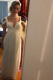 I absolutely love this dress and wear it whenever I can. I have a very small chest so I actually got the cups altered a little to fit me better and was glad I did. I also had the slit made a little higher because I have long legs. All in all I would recommend this dress to anyone! - Delaney R.