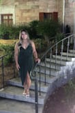 This was exactly what I was looking for! It was a very comfortable yet sexy dress. I usually wear a size M or L and originally ordered a M in black but really wanted the dark green color but they didnt have my size so I decided to size down to S and it still fit so nice! Sizing down helped with the low cut style fit a little better but I would say the dress did seem to ride up a little if I moved too much in it. I also used double sided tape in the bust area for extra coverage. The material is very stretchy and hugged me in all the right places. Definitely suits curvy girls. Overall, Im glad I went with this dress as I got lots of compliments and felt very confident in it! - Adriana E.