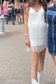 Super cute for a one-time wear. Wore it to the era's tour. I'm tall so it was very short on and me I'm 4.5 months pregnant. Very stretchy. Quality is just OK. One of the straps randomly broke when I was standing in line for merch. We were able to tie it back on. Normally wear a small but got a medium due to baby bump - Jayden S.