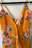 I like the color and wrap style of this dress, but unfortunately, I couldn't get the sizing right. I ordered a medium to start with, and I'm smaller on the top than the bottom---which would work fine with a wrap dress normally, but this one ran large on the top so there was excess fabric at the back and the bust didn't look right in the front. I exchanged it for an extra small because that was the only size left, and it was a better fit but didn't leave any room for a strapless bra. Probably a small would have been perfect but there were none left available in stock. The bottom of the dress is heavier, it has a more formal feel to the dress than I expected from the picture. It has a heavy silk under-lining and see-through over-layer see-through crepe texture. I wouldn't probably wear this to anything less formal than a wedding which doesn't make it super functional for me to re-wear. - Sam B.