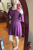 This dress is very fun and flattering. It's on the shorter side. I really like the color. - Emily W.