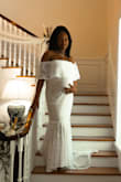 This dress was absolutely perfect for my small wedding. I was 7 months pregnant and just sized up! The quality and fit was absolutely beautiful! - Cari E.