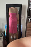 This dress fits pretty well in the stomach and waist, but the top is so blousy! I'm pretty small in the chest department, and I don't think bigger breasts would even help. It is SO BLOUSY. Very disappointed because it's such a fun color and style, but it would require major alterations to actually wear. - Samantha G.
