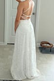 This dress has amazing detail and the sequins make it shiny, and tho I loved it, it didn't give me that bridal feel. I also don't like how thin the straps are and wasn't confident that it would hold up the entire wedding day because there is some weight to the dress. I love the back tho. I'm small chested so I would've needed to either alter or use a sticky bra to boost my girls to fill the front - Jennycka B.