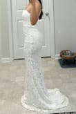 This was a well made dress; however, it runs small so I would go up one size. I have a small chest and it was tight. It hugs your figure and looks simple and elegant but had to return because I loved other dresses more. The straps are also adjustable. - Jennycka B.