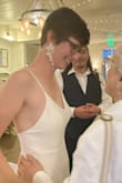 I wanted a simple wedding dress and love that Lulus let me buy any ol dress in white without a "wedding tax"! I had the straps altered to remove the flutter (I wore a sheer jacket) and adjust where they met the back of the dress - the original design was tugging the dress upward and making it lay weird on my lower back and butt. I also added soft cups - this dress will show nipples in cold weather. No other fit problems: I'm tall and this just brushed the ground in sneakers; no adjustments to the waist or bust. Got loads of compliments on the dress and had fun saying "Thanks, it was $80!" - Emily B.