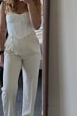 This delicate fabric feels amazing but it is too fragile for the plastic ribs inside the corset..they punctured through, and started coming out after the first use. I went out to brunch with it... so it didn't take much movement to rip. - Valeria G.