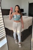 Love this top, it fits well overall and the adjustable straps are nice. My only issue is that it's just slightly too tight on my ribcage, so there were times throughout the night when the top was too restricting. - May C.
