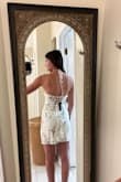 I love it! However, if you are typically an XS buy the S. The XS was a big snug and the S fit better. It is a beautiful dress and I would highly recommend it. - Amelia F.