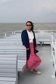 It's amazing. Perfect fit, length and slit. Was worried about the hot pink color but it was not flashy. It's a beautiful pink. Since it was too windy where we were, I had to turn around the skirt and put the slit on the back. It was perfect that way too. - Ashwini B.