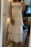 I bought this dress for my bridal shower and it made me feel like a fairy!! So whimsical and I love the way the ruffles look when you twirl :)
It fit perfectly- I got an XS and the fabric was so good quality

And I promise I'm not being paid to leave this review hah - Libby T.