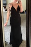 I ended up returning this dress, nothing wrong with it by all means... I just found one I was more happy with on the website! I love how much back it shows, I personally didn't think I had the cleavage for the front lol! But a beautiful dress for sure! - Alexis A.