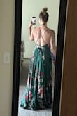 I love this dress! BUT I went with what my true size was and it ran a bit large. So I returned it for a small size- that one FIT PERFECT!! The medium size just didn't hug my boobs like how I wanted it and was a but too long for me. Material is amazing, just a bit heavier than I expected but I am not complaining about it. - Alexis A.