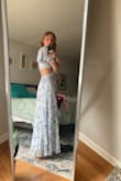 This dress is so beautiful- the fabric is soft and does not wrinkle easily. It fits like a glove! It is light weight- but heavy enough where it will not blow away if it's windy and does not show any under garments. I wish the dress had more colors because I would buy more if I could! - Emily C.