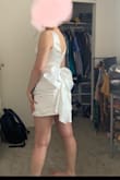 You might see my other review for this dress. I originally ordered an XS and I loved the dress but it was tight. Unfortunately there was an accident while moving and the dress got lost. I wanted to order another one but the XS wasn't in stock. I decided to order the small and I'm so glad I did! It fits better for sure it's a little big in the chest area but I'll fix it with a padded bra. In the XS it was very tight on my midsection and it was a little shorter than I wanted. The small is much better and I'm so happy with it it's my perfect reception dress! - Victoria B.