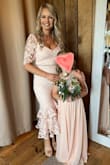 This dress is so beautiful in person! Fits true to size. It wasn't too long for me (being short). I got SO MANY COMPLIMENTS on it! - Alicia W.