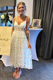 I wore this dress for my bridal shower and it was AMAZING. I've never gotten so many compliments on a piece of clothing. It almost made me want to elope and wear this as my wedding dress! - Lyndsay D.