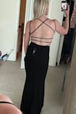 Purchased a size small which fit perfectly. It was also quite comfortable for a formal dress. - Kaylee M.