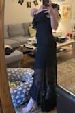 I ordered a size small and it fit perfectly. The fabric was breathable yet sturdy and it didn't feel tight after eating either (wore this to a wedding). I'm on the shorter side so I did not expect it to look like how it looks on the model who seems to have longer legs. The inner part of the dress came down to a little above my knees. However, with a pair of gold strappy heels (also purchased from Lulus), it worked just fine. Even with heels, the bottom of the dress just met the floor but I didn't feel like I was dragging it around all night or anything like that. It was unique and formal. I got a lot of compliments! - Olivia K.