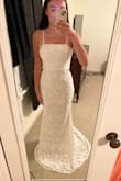 The dress is absolutely beautiful and perfect for my daughter upcoming beach wedding. She is so beautiful in it! - Sandra D.