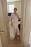 Overall, it's a beautiful dress and will be perfect for my intimate elopement! I do have wide hips so I was worried about the fit and unfortunately, it did end up being a little tight in the hips and a little big in the bust. I could have sized up to a large but then the top portion would have been way too big. The dress also shows panty lines so I plan to get some good shapewear to wear underneath. But all in all, I am in love and very excited to wear it! - Sydney M.