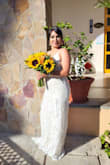 I am so glad I selected this dress for our vow renewal. It fit perfectly and I got so many compliments. The back tail of the dress looked really pretty and the front gave me the hour glass figure. We did a beach setting and the dress was light and fresh. - Raquel V.