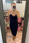I love everything about this dress. The fit is amazing. I usually wear a medium, and I ordered a medium, and it fits really well. The material is thick and a little stretchy, so it hugs you in all the right places without being too tight. I'm 51 years old. If I were 15 years younger I might even order a small for a super snug fit, since it does have a nice stretch. - Christine B.