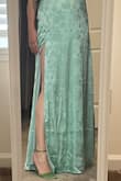 The dress is very well made. The fabric is soft & silky very pretty. The top is lined with a strip of plastic the way that thigh high stockings have one to keep it on. The zipper is smooth & easy to pull up. However  I unfortunately was in between sizes. I find the dress runs too big. I ordered a small the zipper fit but the dress was loose & was falling down at the sleeves. So I returned it got a medium & it's to small the zipper would not go up all the way. I could not return it because for some reason when I tried I was told no return or refund on the dress. So I'm stuck with an $88 dress I can not wear. Maybe I can loose weight not sure or give it to someone smaller than me. But overall it's a really pretty dress. - Lisa F.