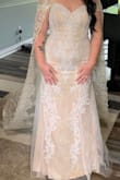 The dress is absolutely stunning! The material is good quality. Absolutely shocked how nice the dress is for the price ! - Gwendolyn R.