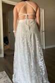 Being shorter, it needs to be hemmed a smidge, but otherwise it fits amazing. I usually am a medium/large & initially ordered a large, so I had to size up but I cannot wait for my wedding day to wear this!! - Miranda J.