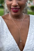 I absolutely ADORE this dress! It's so elegant- the details in the lace are very high quality, I felt like a million bucks and I got so many compliments! I would recommend sizing down, the dress runs large and is very low cut in the front and back. I didn't have time to exchange it before my shower so I had to put a few stitches in the front. - Lorrie H.