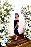 I did have to have it hemmed. It was too long and it overwhelmed my frame. But it fit like a glove and it was perfect for dancing. It really stays in place and no bra needed either. The material is thick. - Roselyn L.