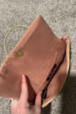 This is such a cute and detailed purse. Perfect for an orange dress on a night out - Hayley E.